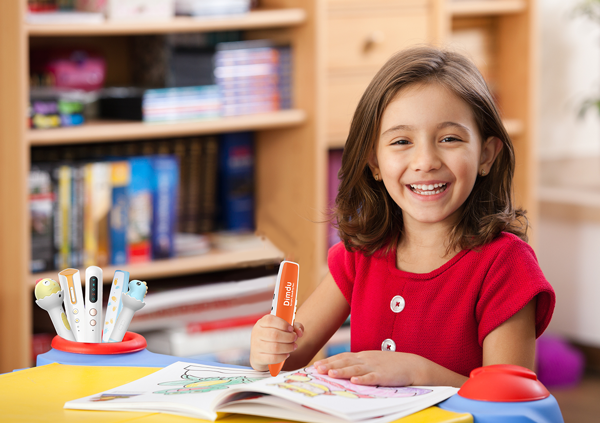 Kindergarten student developing phonological awareness with Dimdu smart pen. Kindergarten student developing phonological awareness with Dimdu smart pen.